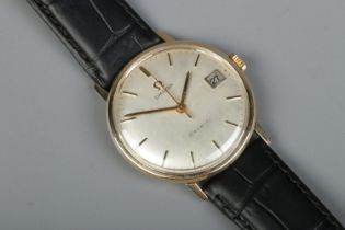 A gents 9ct gold Omega Geneve manual wristwatch. Having centre seconds, baton markers and date