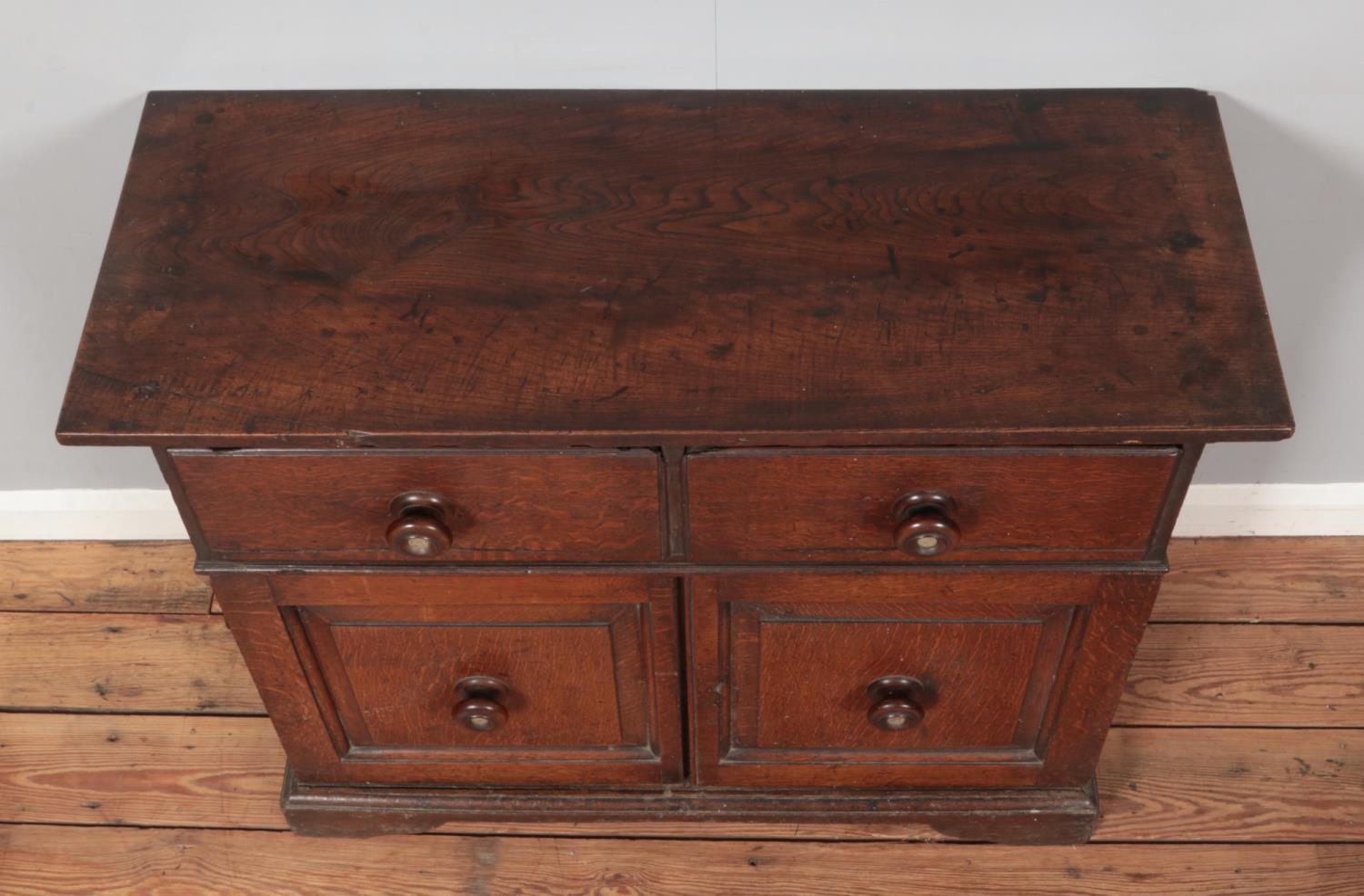 A Georgian oak sideboard, having two drawers and cupboard base. Right hand side door loose. - Image 2 of 2