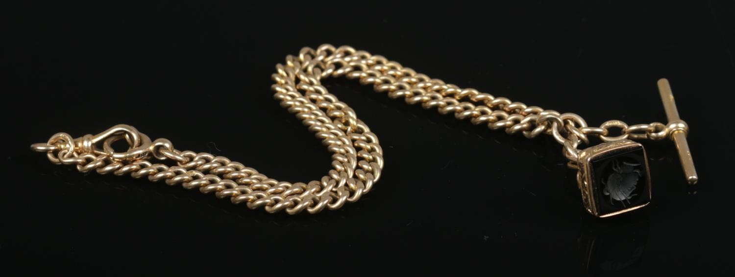 A 9ct gold Albert chain with seal fob and T-bar. Approximate length 45cm. 46.2g (without fob). - Image 3 of 3