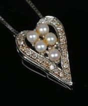 A 9ct white gold Vicenza pendant on chain set with freshwater pearls surrounded by diamonds. Total