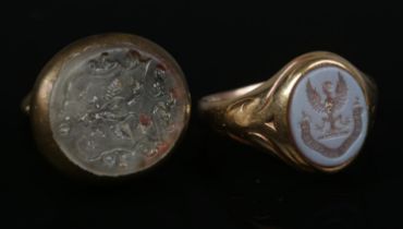 A gold seal ring along with a brass and glass seal fob. Ring size R (4.36g). Ring cut in two