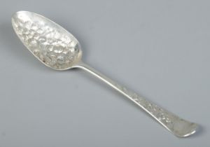 A George III silver berry spoon. Assay marks for London, possibly 1771. 57g.