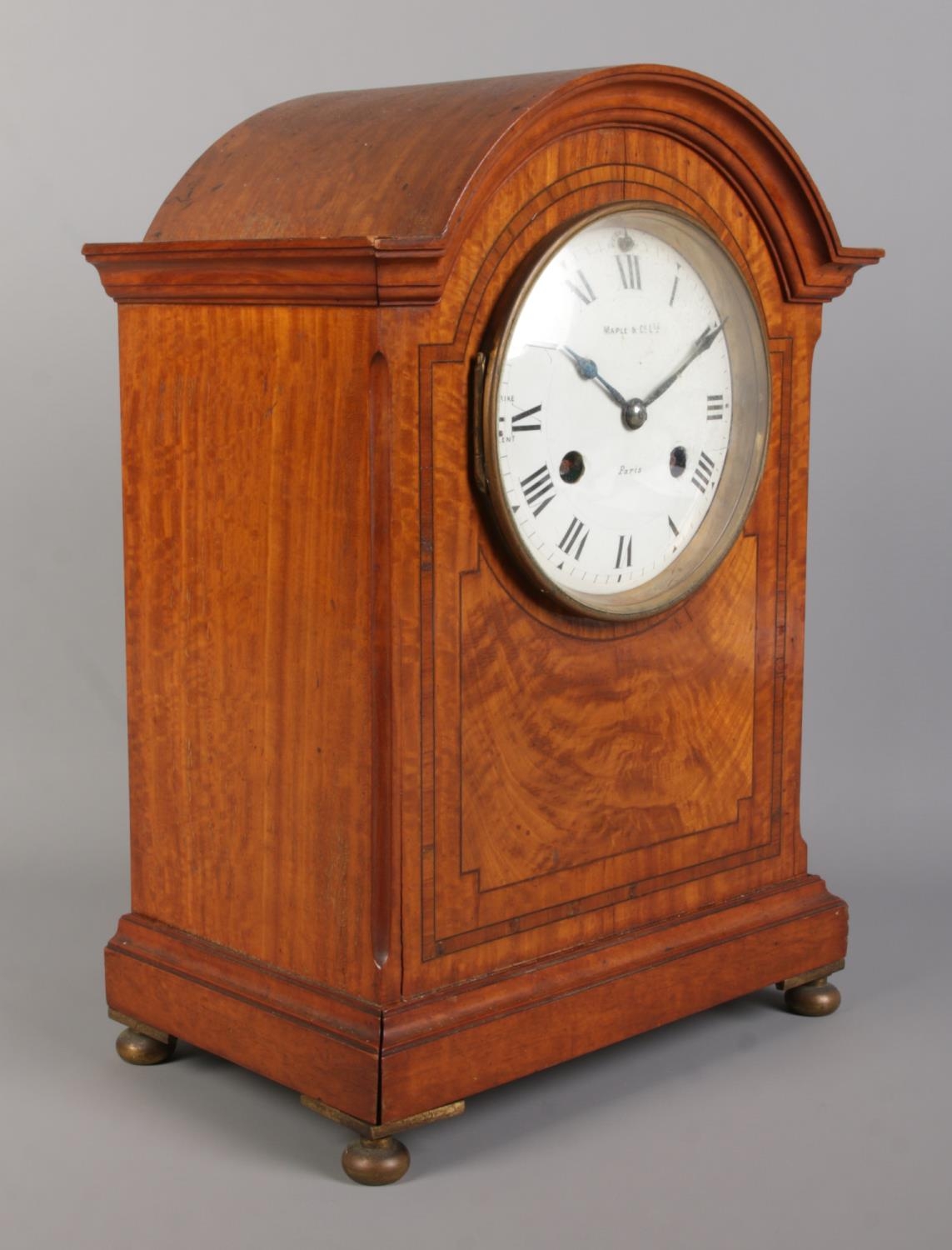 A Maple & Co Ltd. mahogany eight day bracket clock. Having enamel dial, Roman numeral markers and - Image 2 of 4