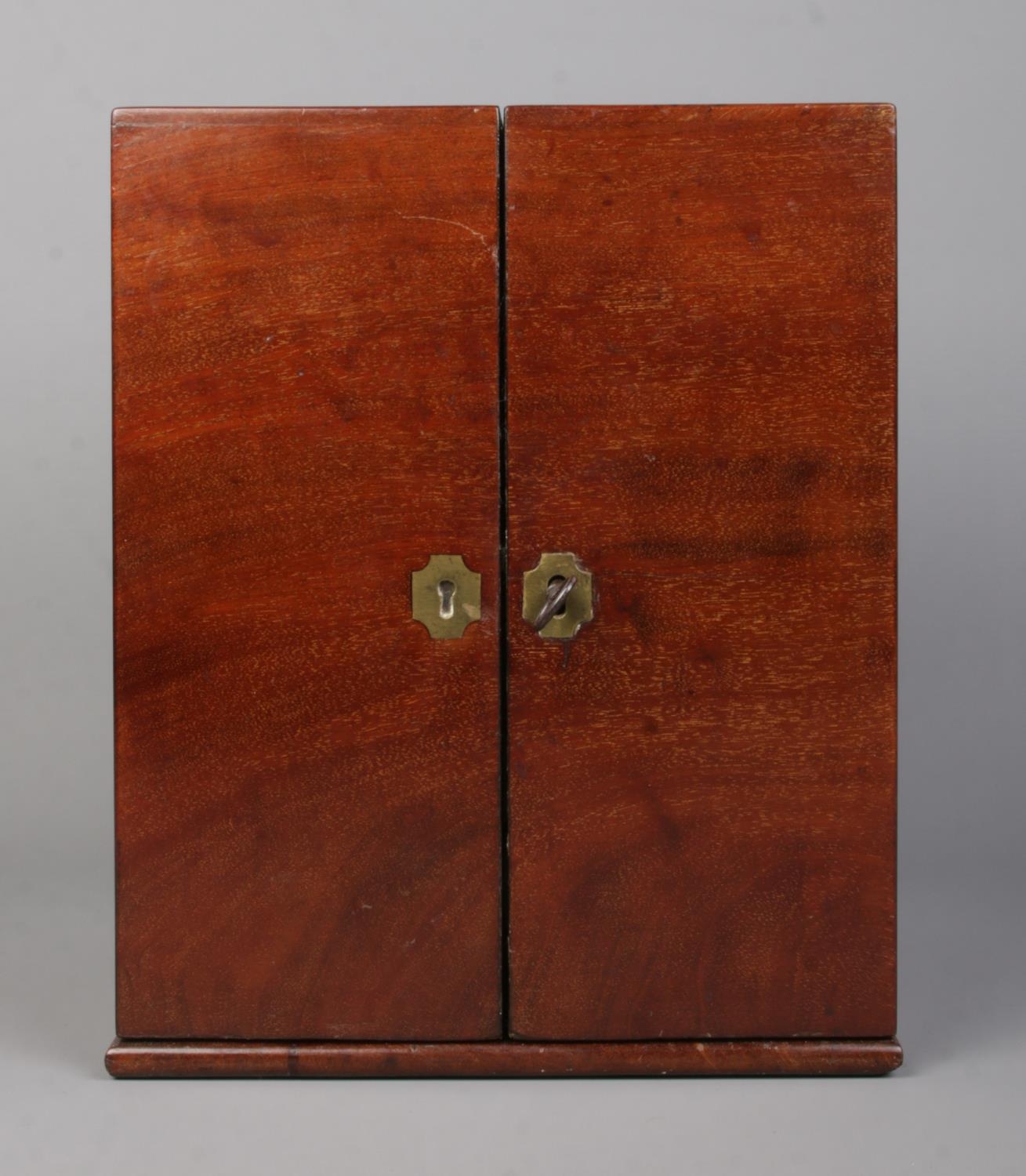 An early 19th century mahogany apothecary cabinet with double door front. Having brass campaign - Image 4 of 4