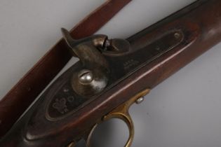 A Victorian Tower Enfield pattern two band rifle. The lock plate with crown VR and stamped Tower and