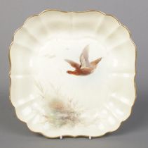 James Stinton for Royal Worcester, a porcelain dish with hand painted scene depicting grouse in
