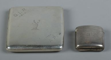 A silver cigarette case along with a silver vesta case, both monogrammed GLR 1919. The cigarette