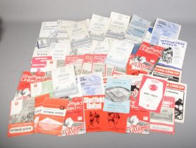 A box of Sheffield United and Sheffield Wednesday football programmes from the 1950's, 60's and 70's