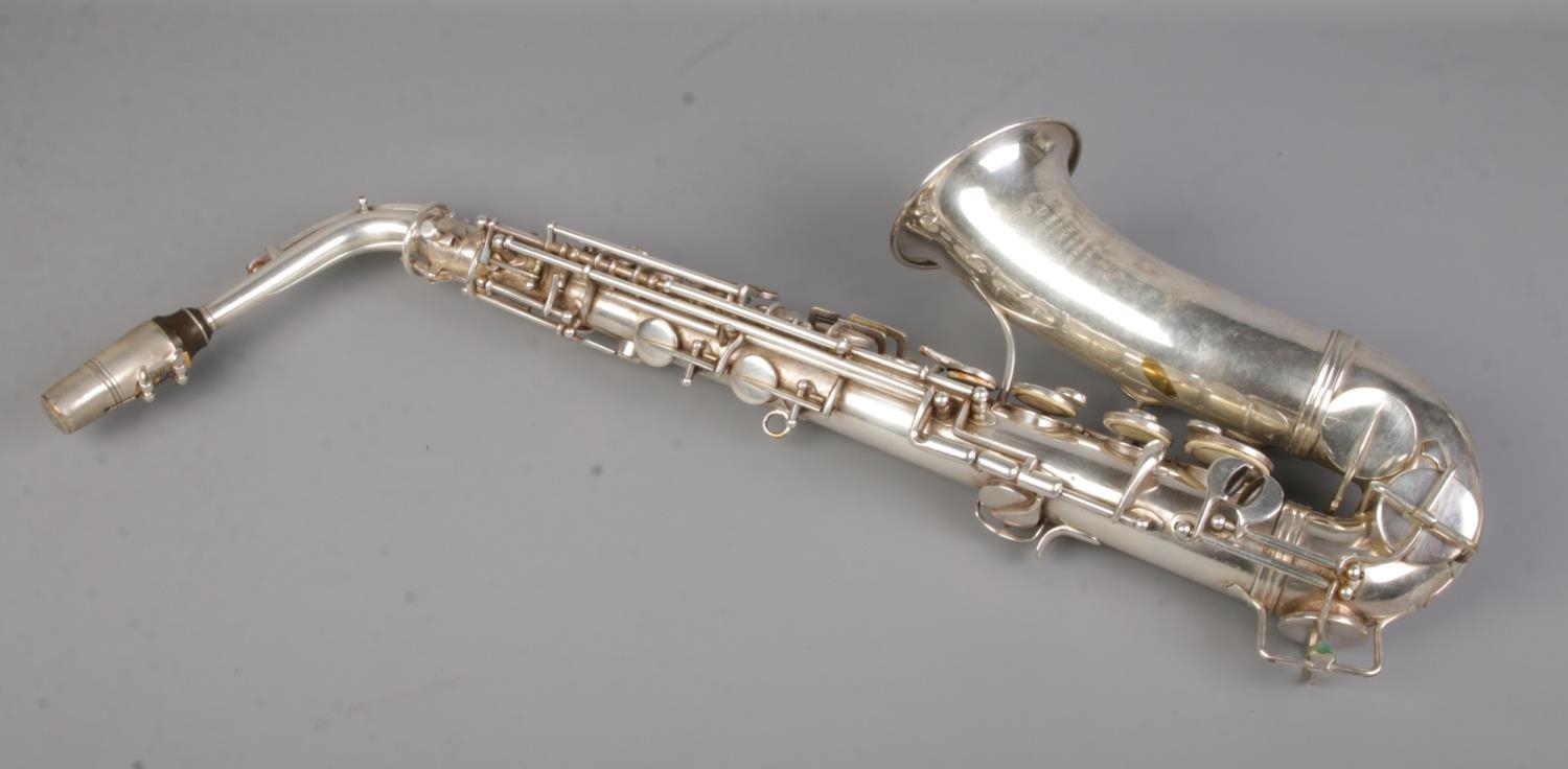An early 20th century French silver plated saxophone by Couesnon & Cie. In case. - Image 6 of 6