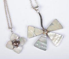 Two silver and mother of pearl necklaces formed as flowers. Approx. total weight 45.3g.