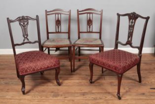 Two pairs of antique chairs. Including a pair of Edwardian inlaid examples.