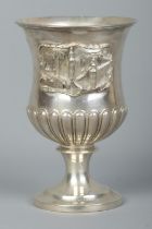A William IV silver goblet decorated in relief with landscape scenes and buildings. Assayed London