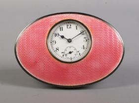 An Art Deco silver and pink guilloche enamel desk clock. Assayed Birmingham 1924. Height 5.5cm. Does