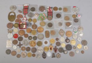 A quantity of coins, fobs and collectables. To include Railway pay cheques, 1956 Road Operators