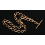 A 18ct gold Albert chain and T-bar. Length approximately 36cm. 49.43g. Good condition.