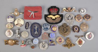 A collection of assorted badges, mainly military. To include Royal Engineers, Civil Defense, The