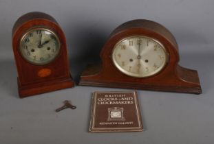 Two inlaid wooden cased mantle clocks along with Kenneth Ullyett: British Clocks and Clockmakers