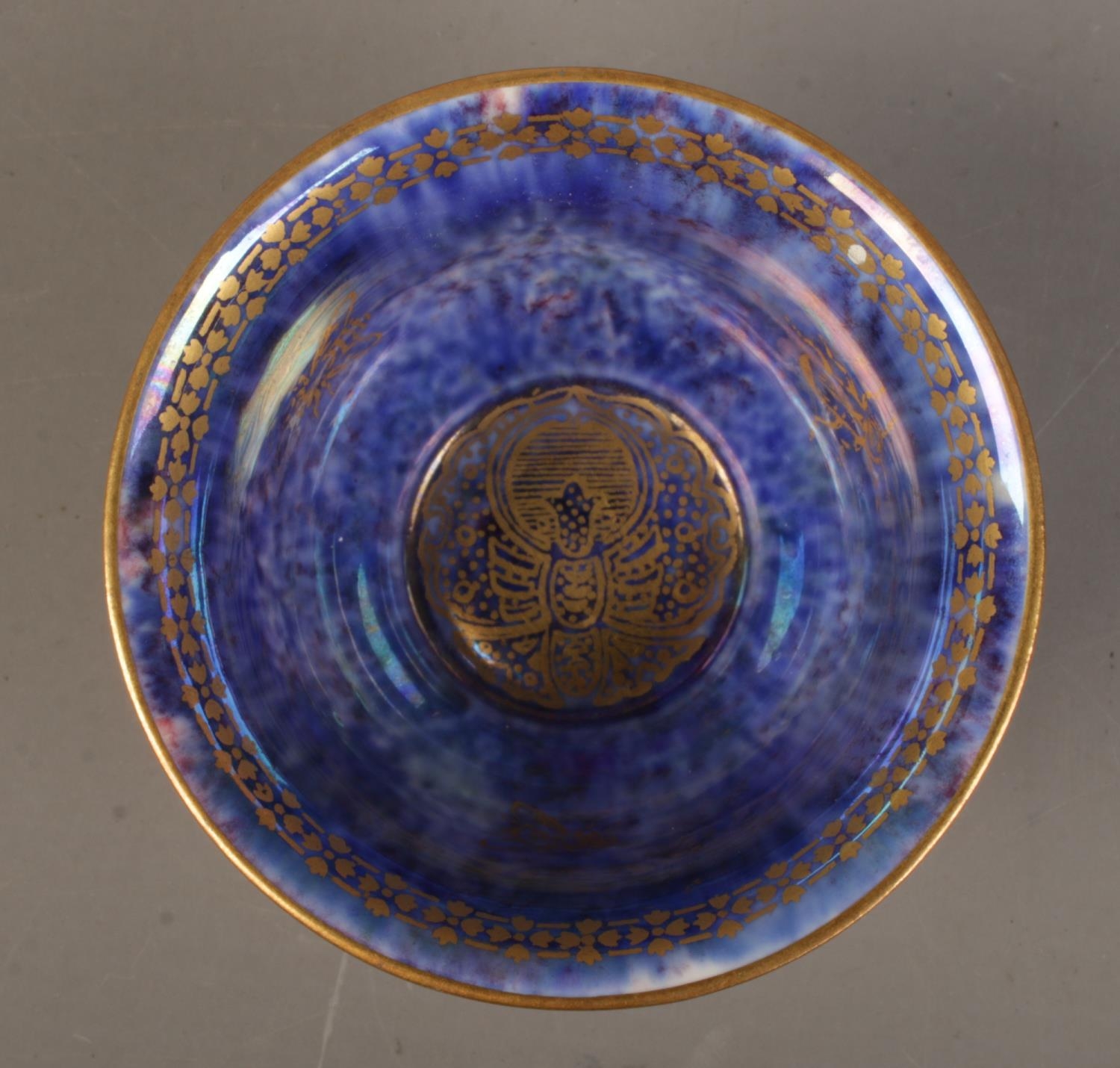 A Wedgwood Lustre miniature bowl by Daisy Makeig Jones, decorated with motifs. Having mottled orange - Image 2 of 3