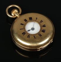 An 18ct gold demi hunter fob watch. Engraved with monogram to back of case. 53.11g gross weight.