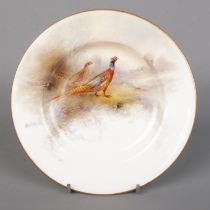 James Stinton for Royal Worcester, a porcelain plate with hand painted scene depicting male and