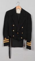 A Royal Navy Lieutenant Commander's mess dress. Including jacket, waist coat and trousers.