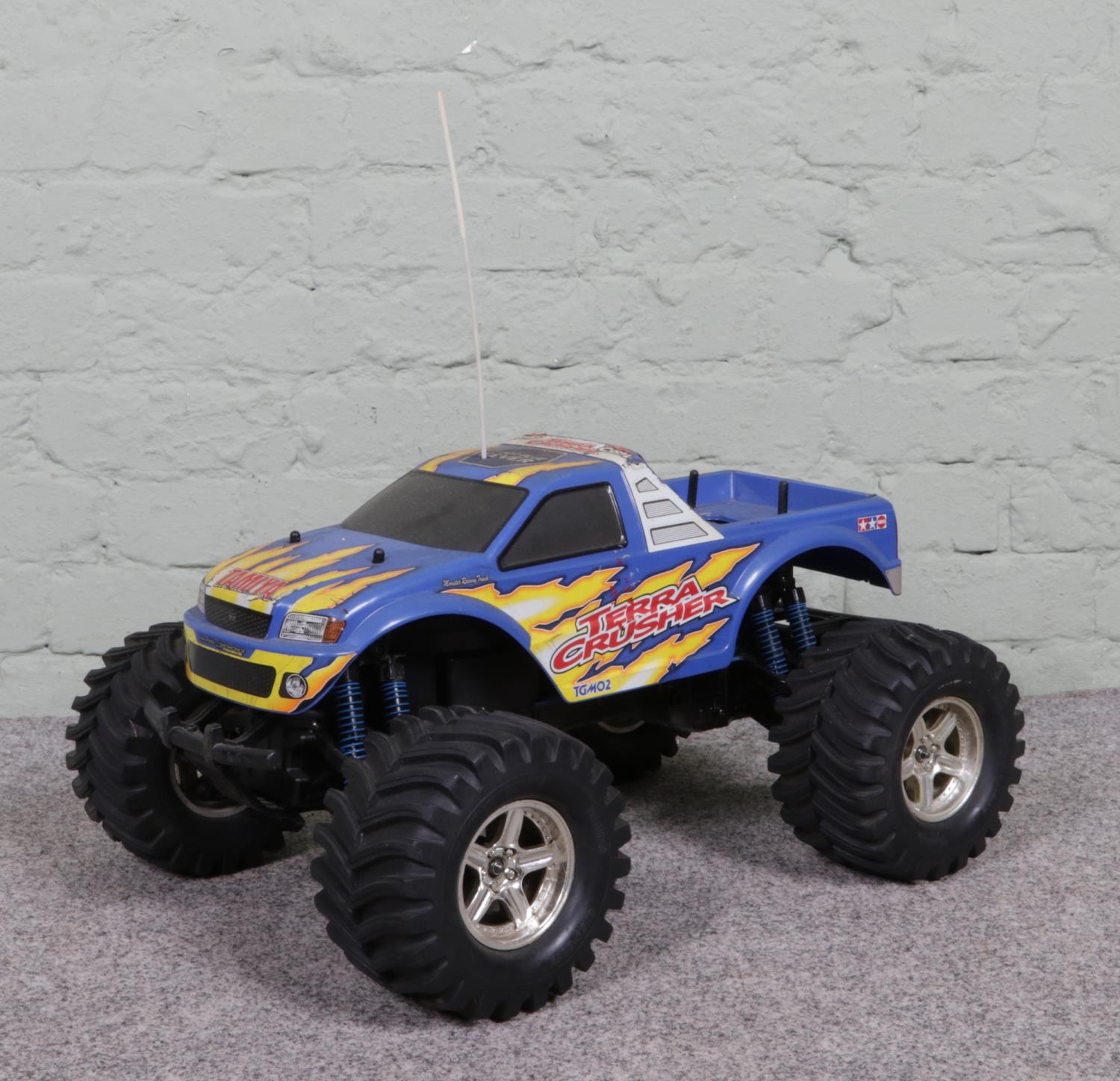 A Tamiya 'Terra Crusher' TGM02 remote controlled monster truck. Missing controller, cannot test.