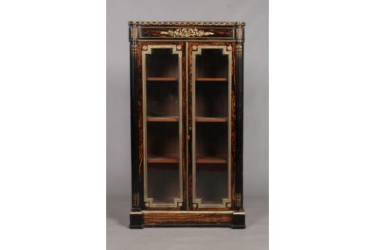 A 19th century coromandel pier cabinet with gilt metal mounts. Ebonised to side and top with - Image 1 of 3