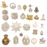 Twenty six British Army cap badges and Scottish clan badges, ten of which are Sterling silver.