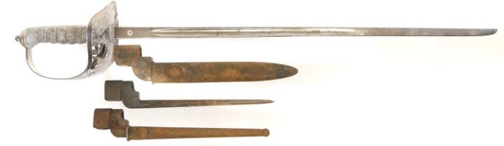 Three Lee Enfield No.4 rifle bayonets, including two rare Cruciform bayonets and sword blade bayonet