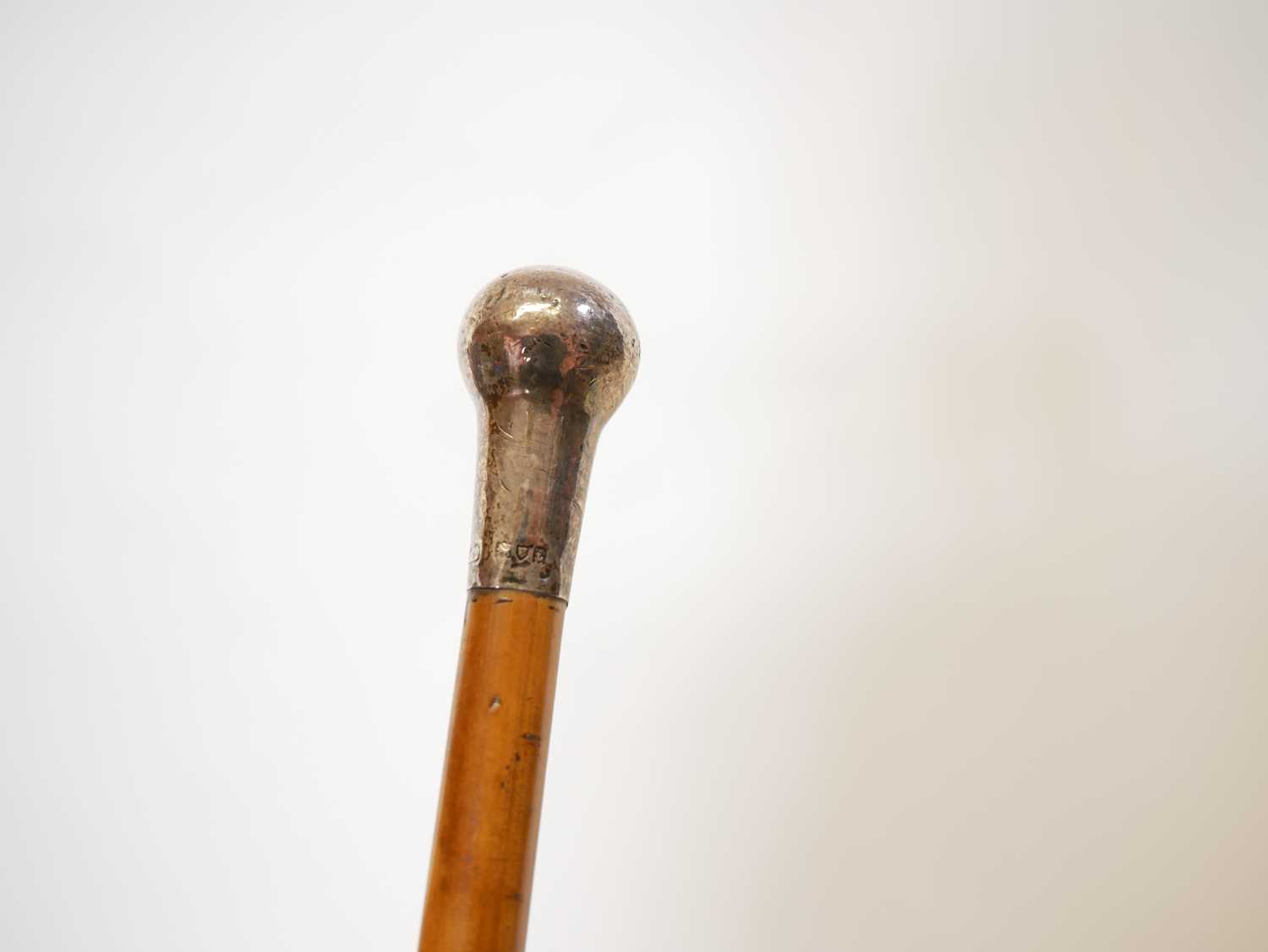 Two truncheons, one stamped W96, together with a silver topped swagger stick bearing London 1914 - Image 3 of 3