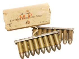 Sixteen original inert 9 X 23mm cartridges in chargers for M1912 Steyr-Hahn pistol and the MP34