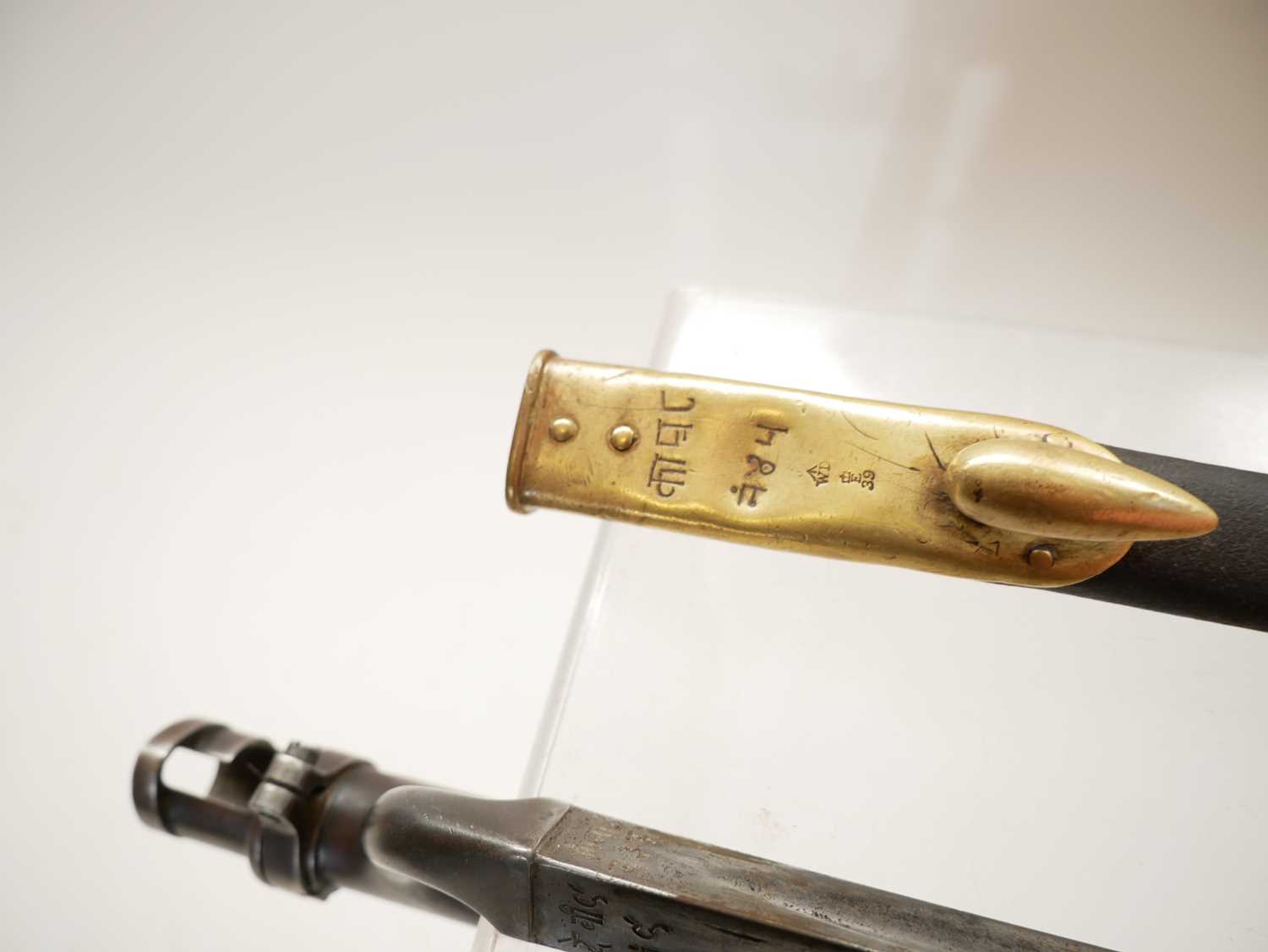 British Martini Henry Pattern 1876 socket bayonet and scabbard, with War Department stamps. Buyer - Image 6 of 8