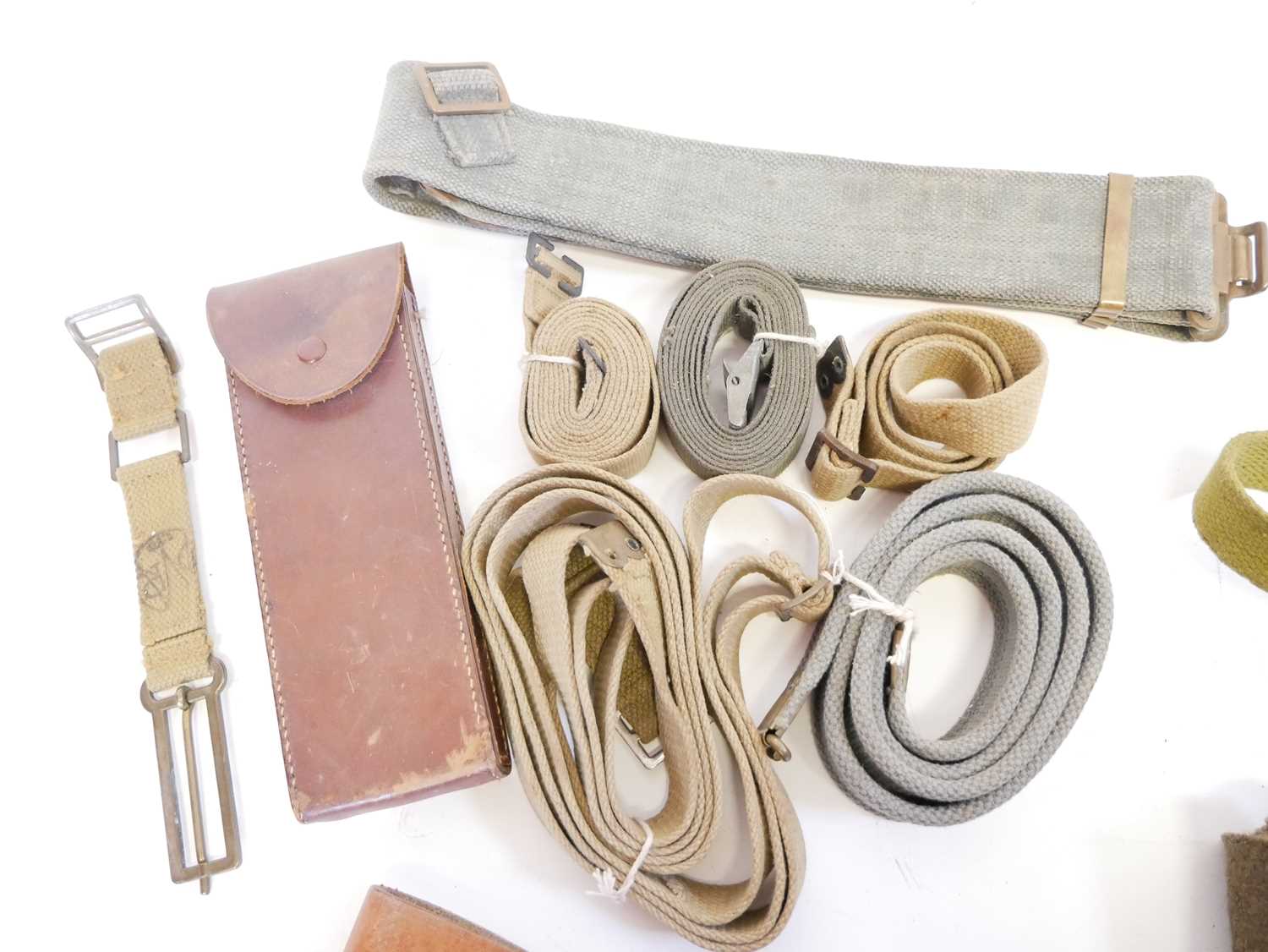 Collection of military items, including a kit rucksack, gun slip, leather and webbing belts, two - Image 3 of 9