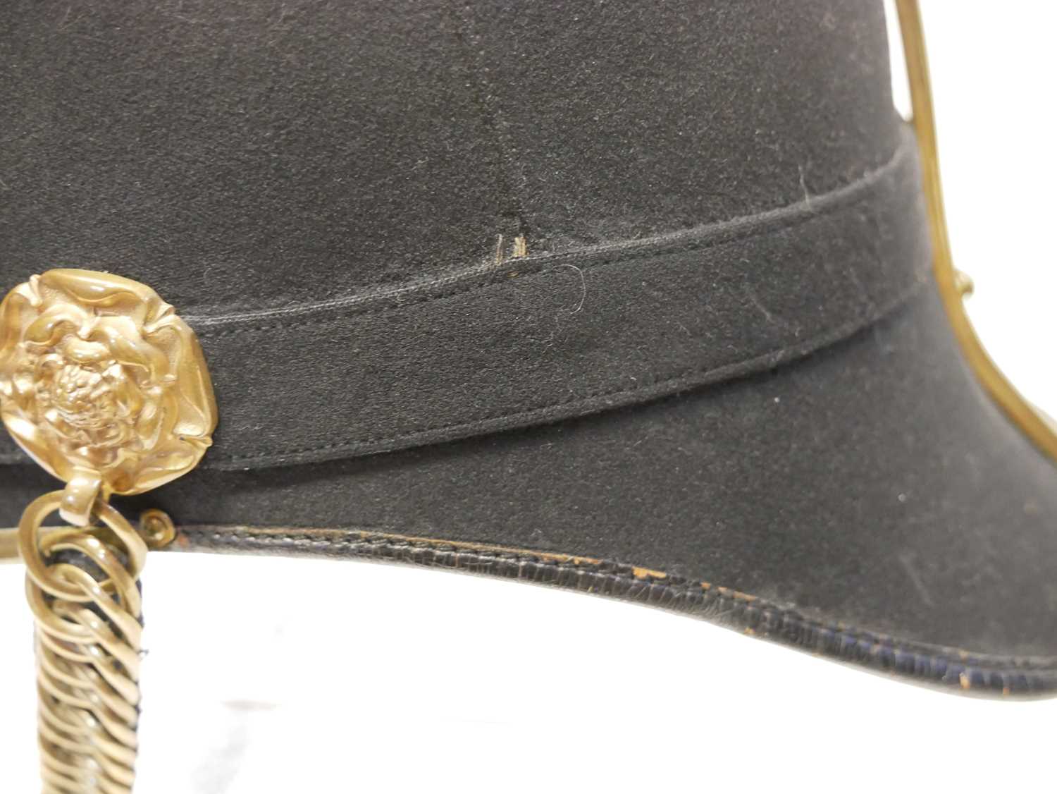 Victorian blue cloth helmet, with The Suffolk Regiment badge, retailed by Hawkes and Co. with ' - Image 8 of 17