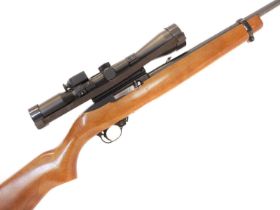 Ruger 10-22 .22lr semi auto rifle, 18 inch barrel with fold down rear sight and fixed front sight,