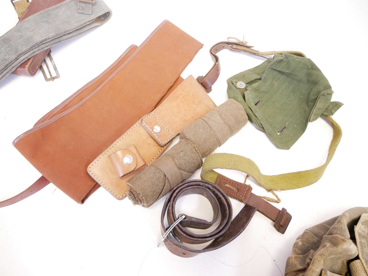 Collection of military items, including a kit rucksack, gun slip, leather and webbing belts, two - Image 6 of 9