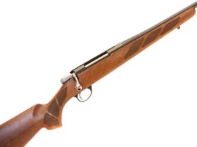 Tikka T3 .243 bolt action rifle, 22inch barrel screw cut for a moderator, chequered wood stock,