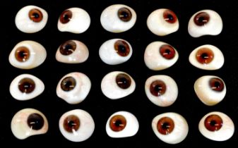 Twenty late 19th or early 20th century prosthetic glass eyes