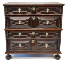 A late 17th century oak geometric moulded chest of drawers.