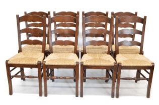 Eight George III style Oak Lancashire Ladder Back Chairs