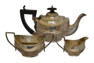 An Edward VII silver three piece tea set,