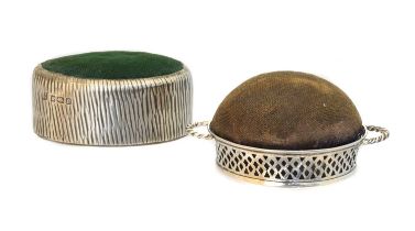 Two silver pin cushions,