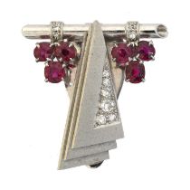 An Art Deco diamond and ruby dress clip by Alabaster & Wilson,