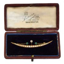 A Victorian crescent brooch,