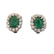 A pair of emerald and diamond clip earrings,