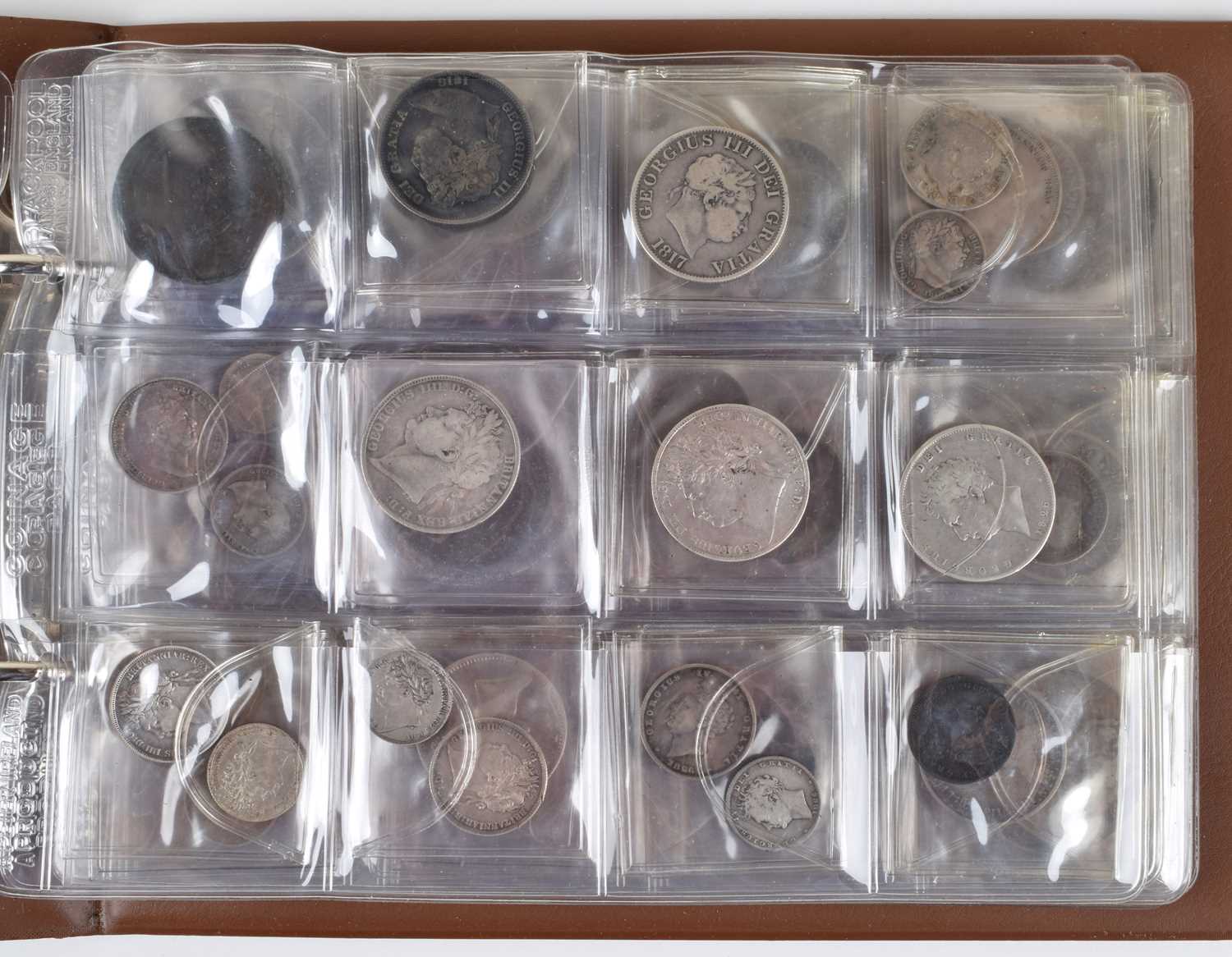 One album of historical British coinage dating from William and Mary through to George V. - Image 5 of 22