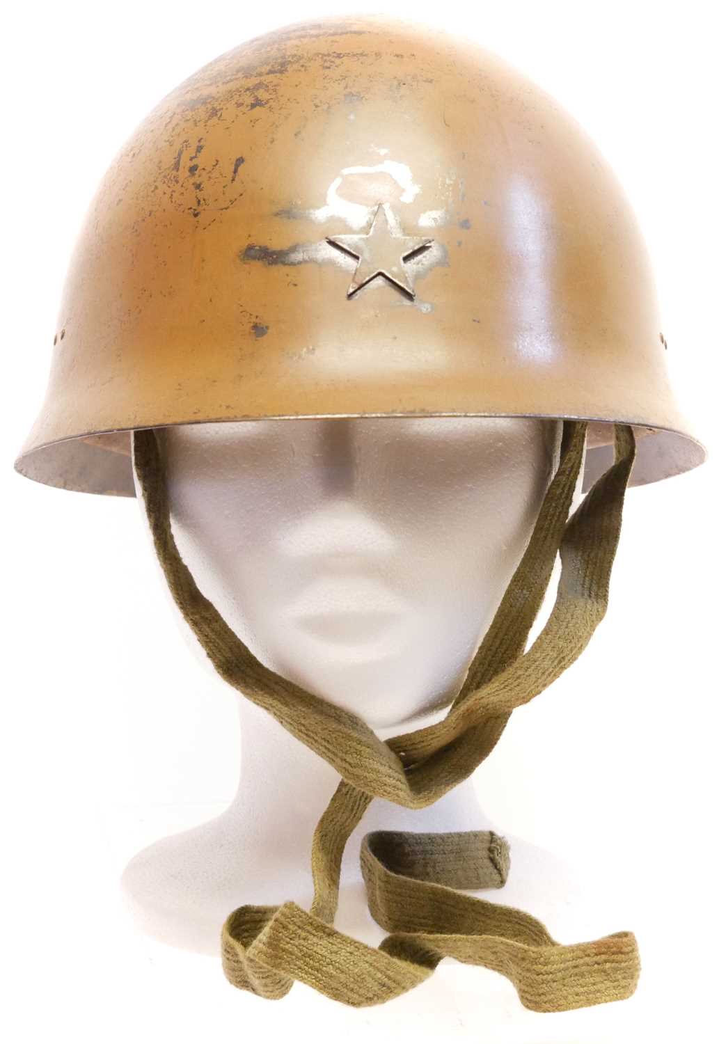 Japanese Type 90 Helmet, stamped 1543, with leather liner, repainted and aged, the helmet original