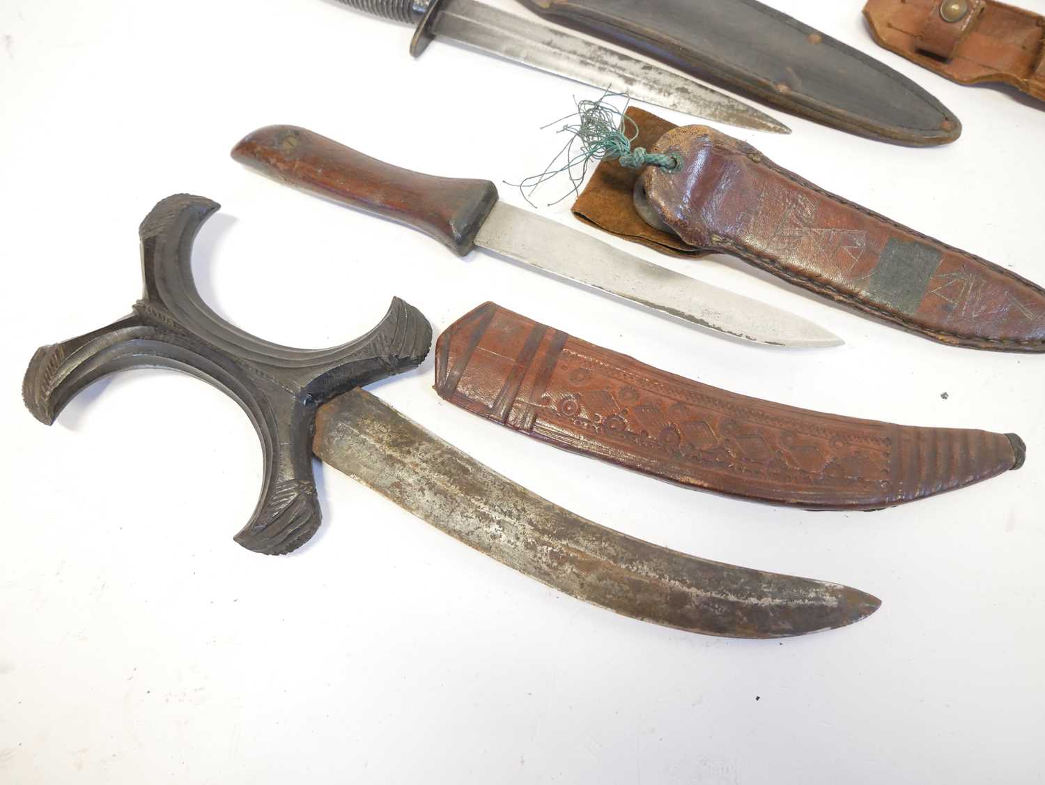 Collection of knives, to include a Fairbairn Sykes dagger, a Hadendoa warrior's dagger, curved - Image 4 of 14
