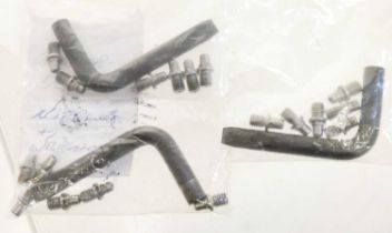 Three sets of Ruger Old Army revolver nipples, each with a nipple key.