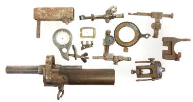 Assorted vintage target sights including a Galilean foresight lens for a Long Lee Enfield rifle.